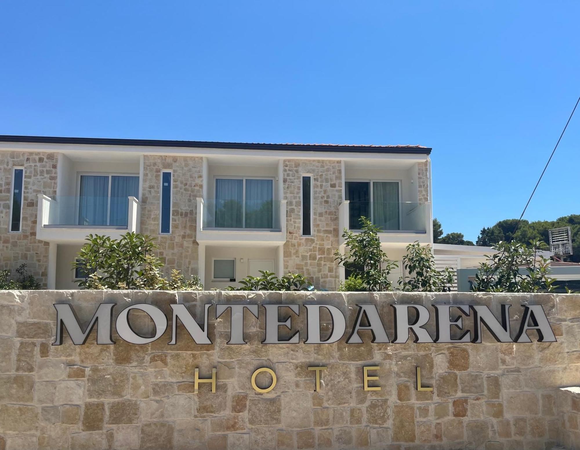 Montedarena Hotel Pulsano Esterno foto